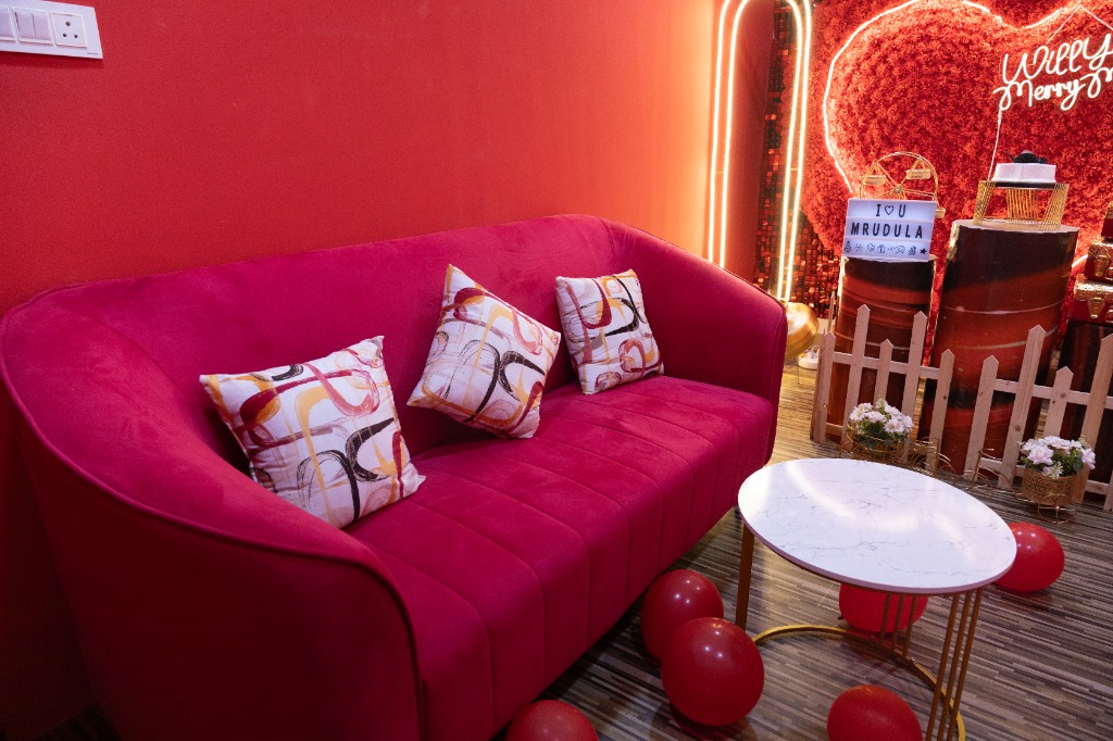 Plush Red Velvet Couch & Intimate Lounge